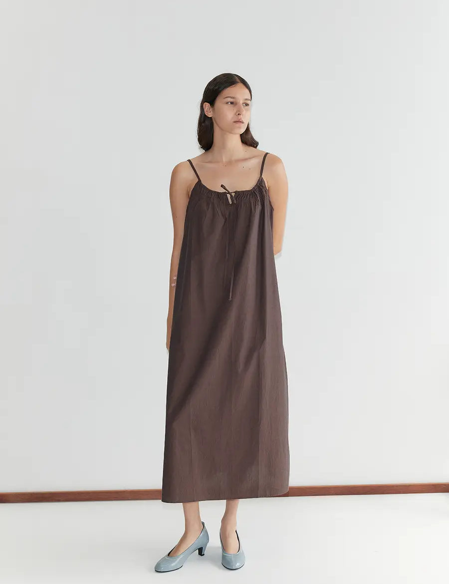 Deiji-Studios-Light-Maxi-Dress-Toast-Model-Front.webp