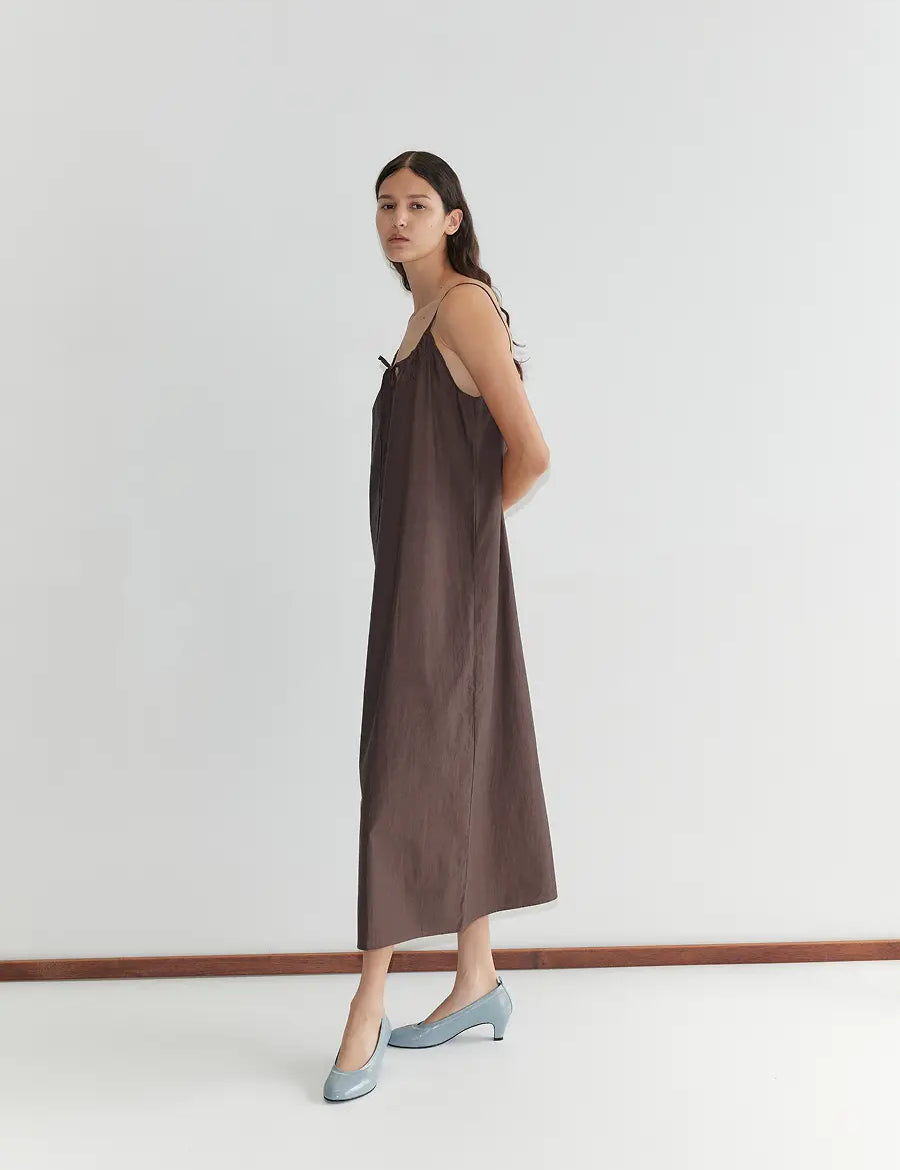 Deiji-Studios-Light-Maxi-Dress-Toast-Model-Side.webp