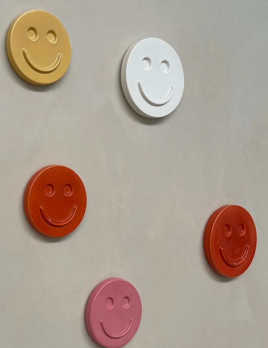 Edith-Beurskens-Happy-Smiley-Orange-15cm-on-Wall.webp